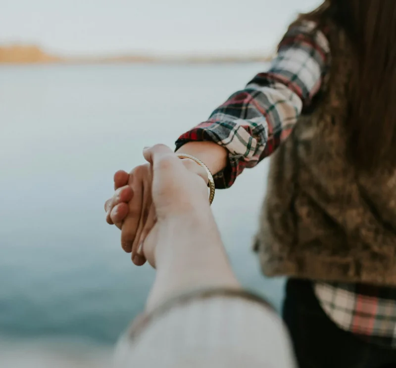 Couple holding hands